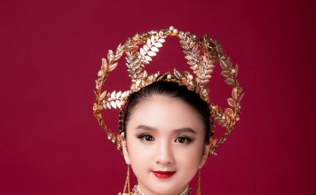 Mẫu nhí Diễm Quỳnh hóa nữ thần ánh sáng với áo dài Khiêm Nguyễn